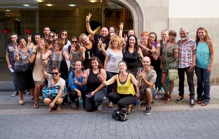 Asistentes al Pleno celebran la aprobación de la PNL.